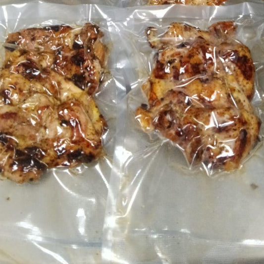 Vac. sealed grilled chicken thighs.